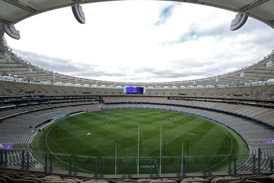Wide angle photo of the ground at Optus Stadium from high in the spectator stands.