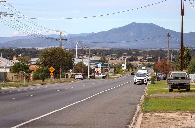 Photo looking along a road towards a mountain the background of a typical Australian town scene in Ararat, Victoria.